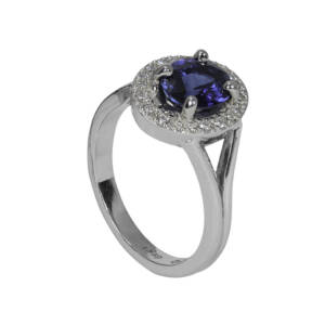 Oval sapphire with diamond in palladium