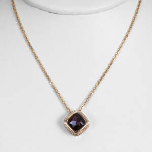 Cushion garnet in 14k yellow