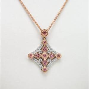 Evolution Platinum and 14k Rose Gold with 1.12cttw Dimonds