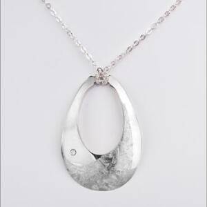 Sterling Silver Textured Pear Shape with .05cttw Diamond