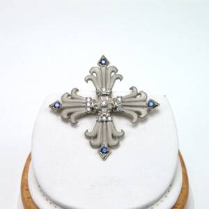 14k white gold pin with .26cts of sapphires and .30cts in diamonds