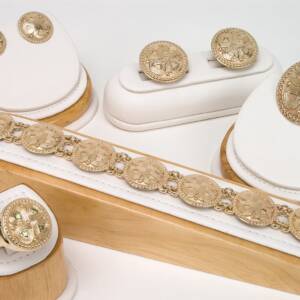 The set of jewelery from "the Past" NYS Capitol Building- details from a column at the edge of the steps