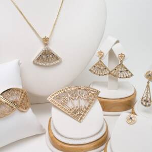 A 14k Yellow gold set- details from "the Past" from Albany City Hall