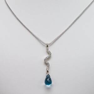 A 4.056ct Blue Topaz Briolette with .24ctf of diamonds in 14k white gold