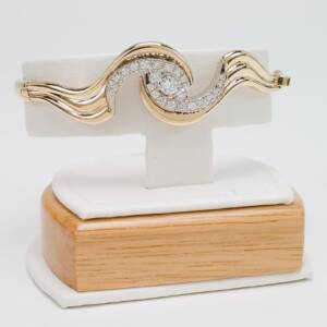 14K two tone bracelet with .91cts of Diamonds