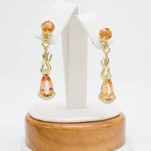 Matching earrings 5.32cts of Precious Imperial Topaz with .24cts of diamonds  in 18K yellow gold