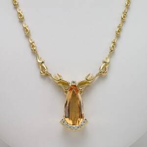 10.16ct Precious Imperial Topaz in 18K yellow gold with .24cts of diamonds 1/1