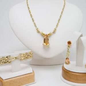 14K yellow gold bracelet with .15cts of cognac and .48cts of white diamonds