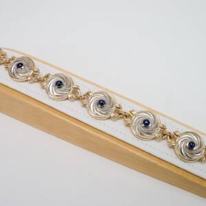 14K TT with 3.94cts of sapphire cabochons